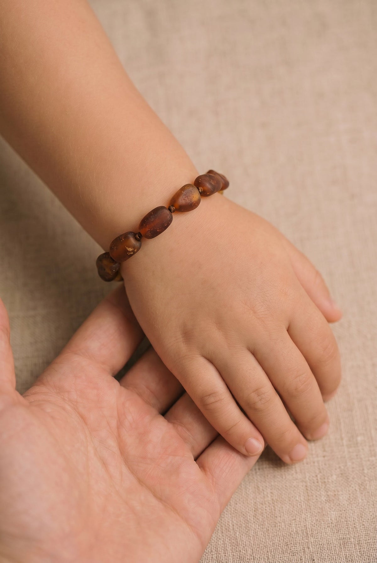 Baby/Child - Amber Bracelet - Oval Raw Beads - Cognac - 14cm