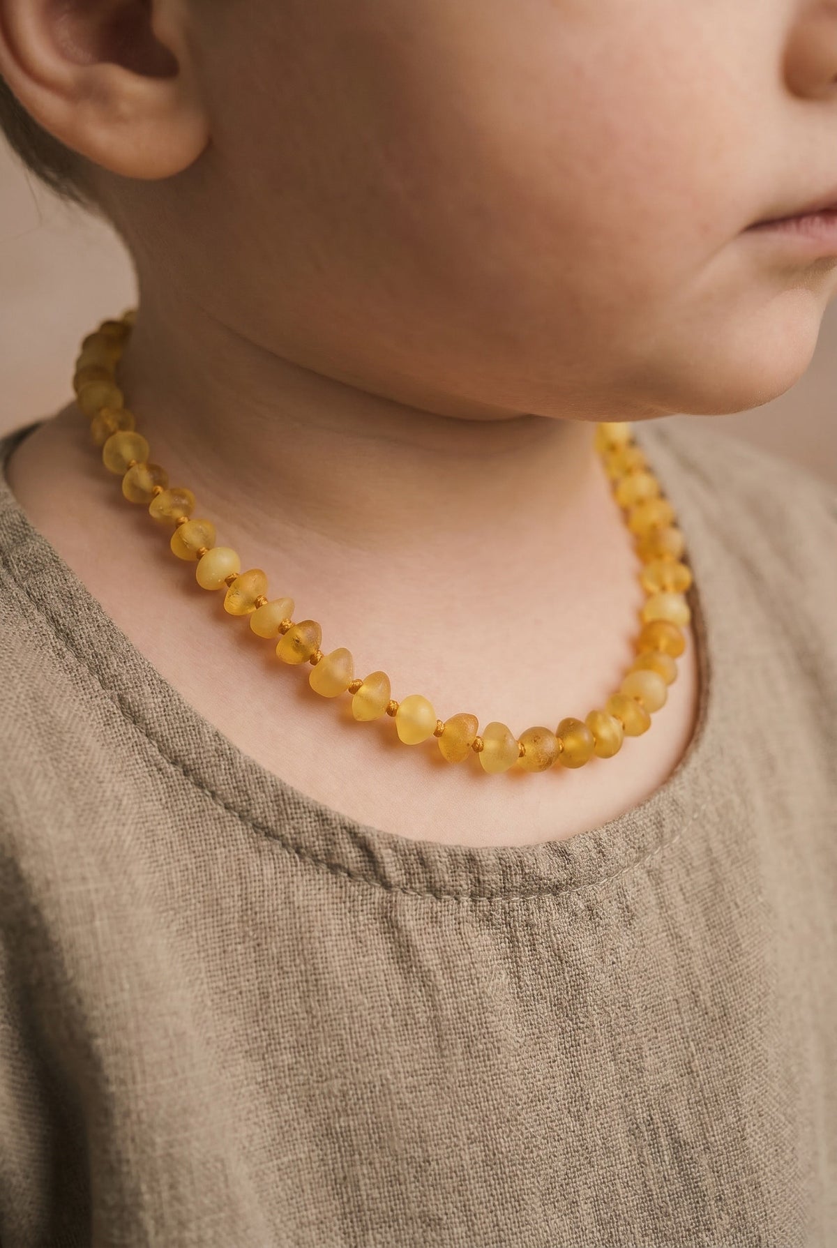 Baby/Child - Amber Necklace - Lemon - Semi-Round Raw Beads - 33cm