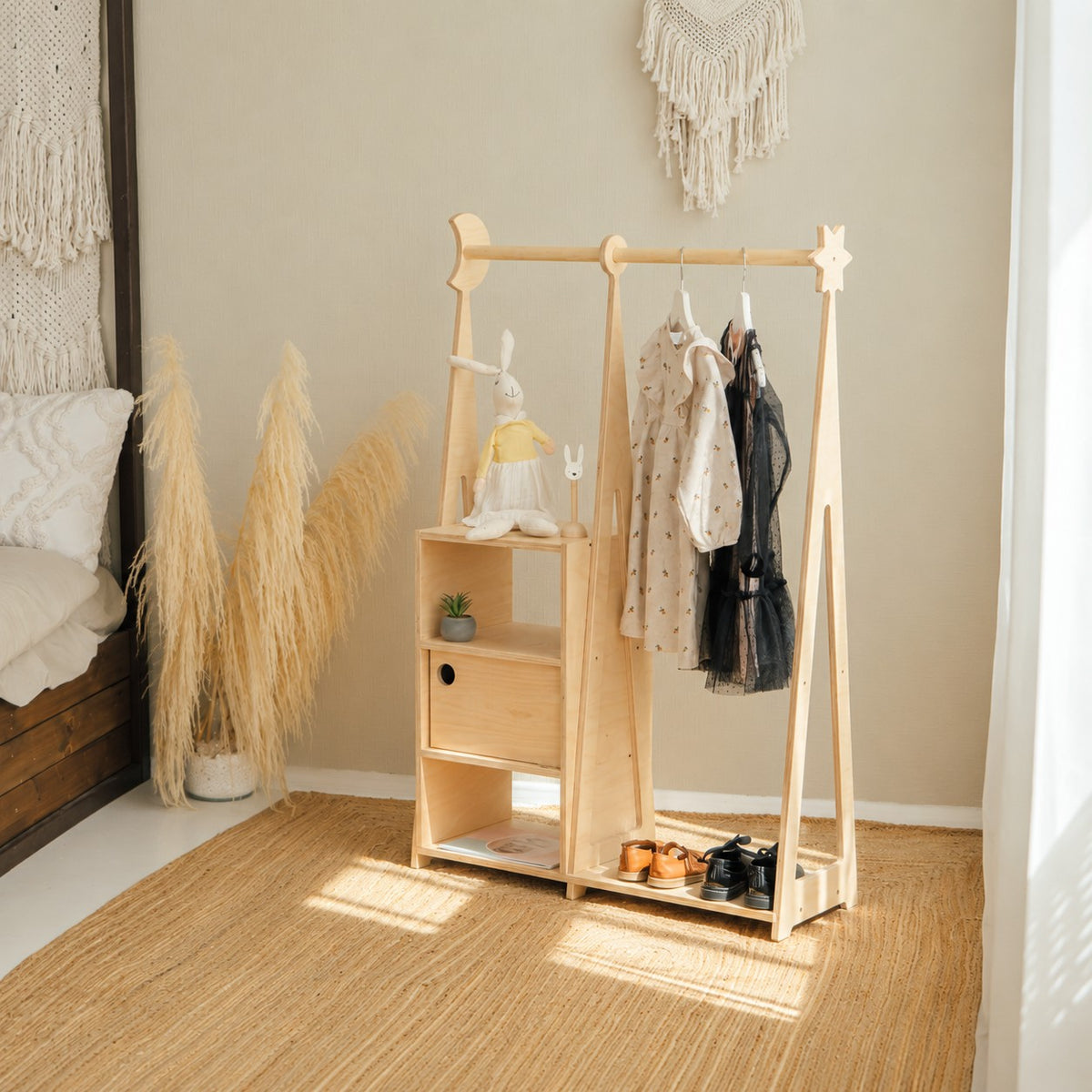 Kids Montessori wardrobe in natural birch plywood, open showing hanging rail and shelf
