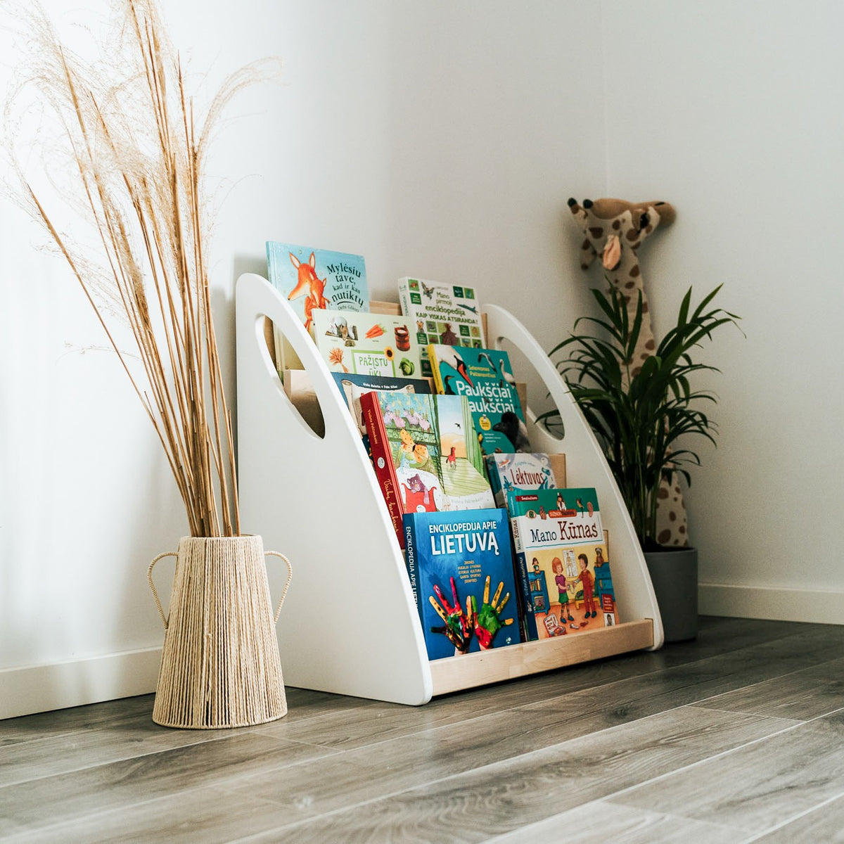 One Little Pine Montessori Bookshelf With Book Storage, 4-shelf front-facing birch wood bookcase with rear storage compartment, Montessori furniture (available in Natural Wood, Clear Oil, and White & Clear Oil finishes)