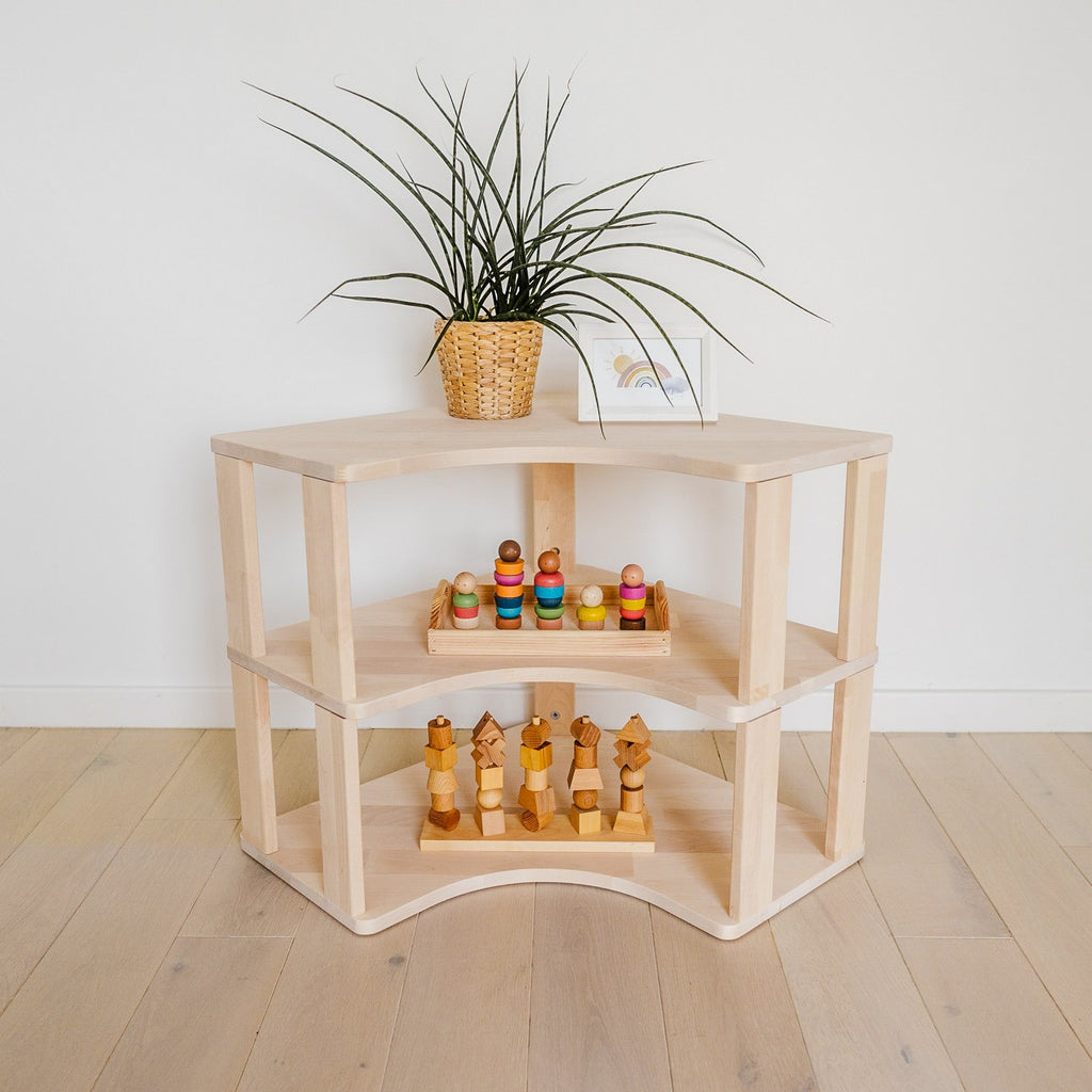 One Little Pine Modular Montessori Shelf Corner, 3 shelves, Natural Wood / Clear Oil / White finishes — solid wood Montessori corner shelving unit for kids' rooms