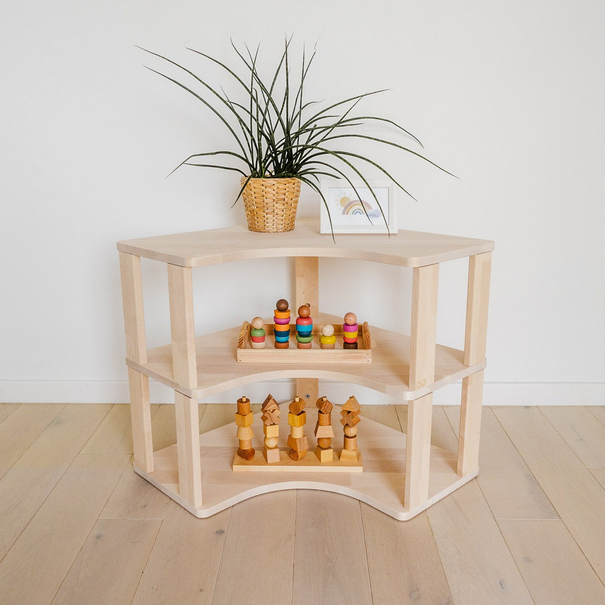 One Little Pine Modular Montessori Shelf Corner, 3 shelves, Natural Wood / Clear Oil / White finishes — solid wood Montessori corner shelving unit for kids' rooms