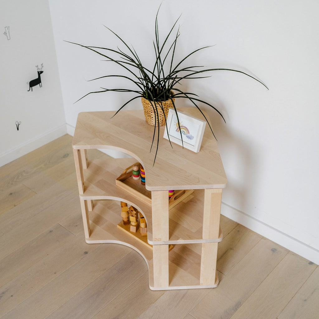 One Little Pine Modular Montessori Shelf Corner, 3 shelves, Natural Wood / Clear Oil / White finishes — solid wood Montessori corner shelving unit for kids' rooms