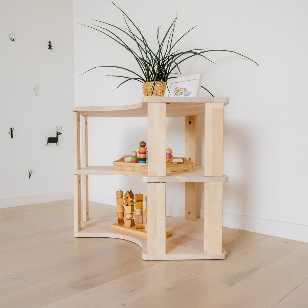 One Little Pine Modular Montessori Shelf Corner, 3 shelves, Natural Wood / Clear Oil / White finishes — solid wood Montessori corner shelving unit for kids' rooms
