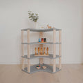 One Little Pine Modular Montessori Shelf Corner, 4 shelves, Light Grey / Clear Oil — solid wood Montessori corner shelving unit for kids' rooms