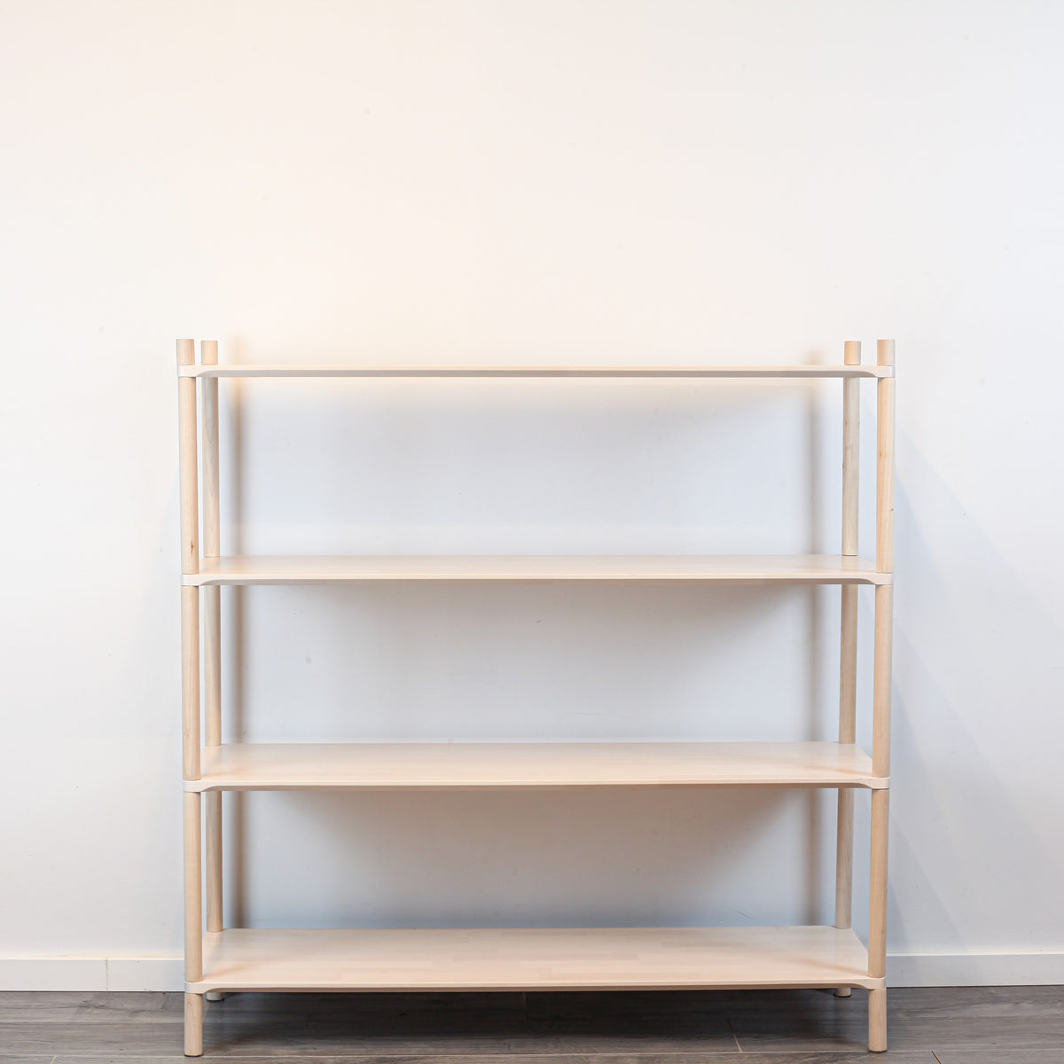 One Little Pine Large 4-Shelf Montessori-Inspired Wooden Shelving Unit styled with books and toys, Montessori-style kids storage furniture.