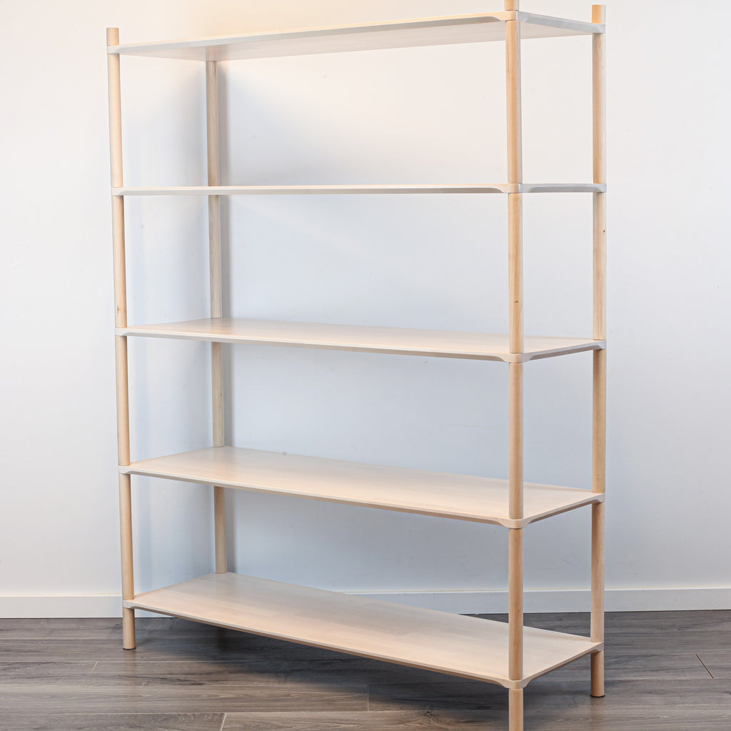 One Little Pine Large 5-Shelf Montessori-Inspired Wooden Shelving Unit shown from an angled view, highlighting the open shelves at child height.