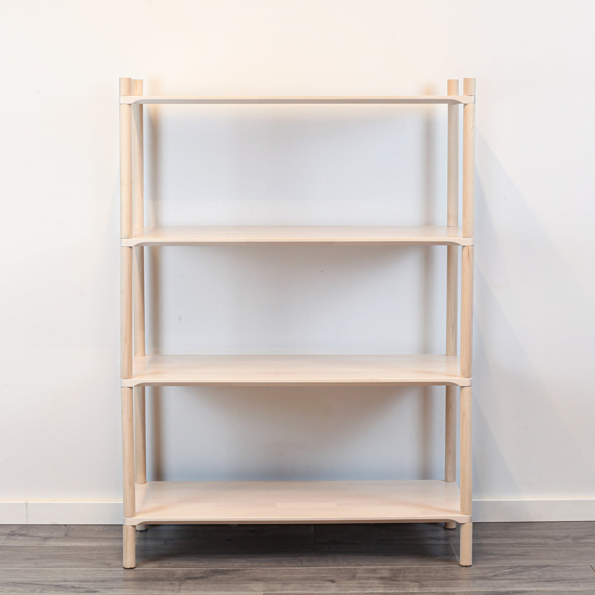 One Little Pine Medium 4-Shelf Montessori-Inspired Wooden Shelving Unit styled with books and toys, Montessori-style kids storage furniture.