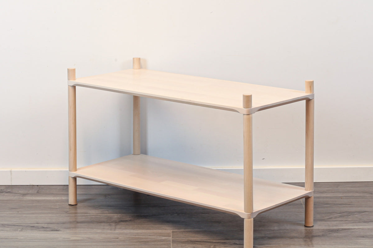 One Little Pine Medium 2-Shelf Montessori-Inspired Wooden Shelving Unit shown from an angled view, highlighting the open shelves at child height.