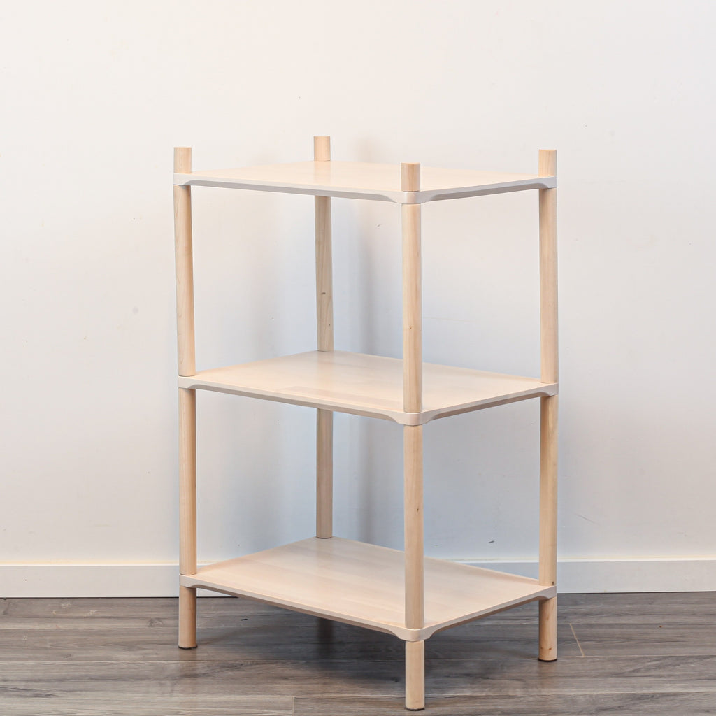 One Little Pine Small 3-Shelf Montessori-Inspired Wooden Shelving Unit shown from an angled view, highlighting the open shelves at child height.