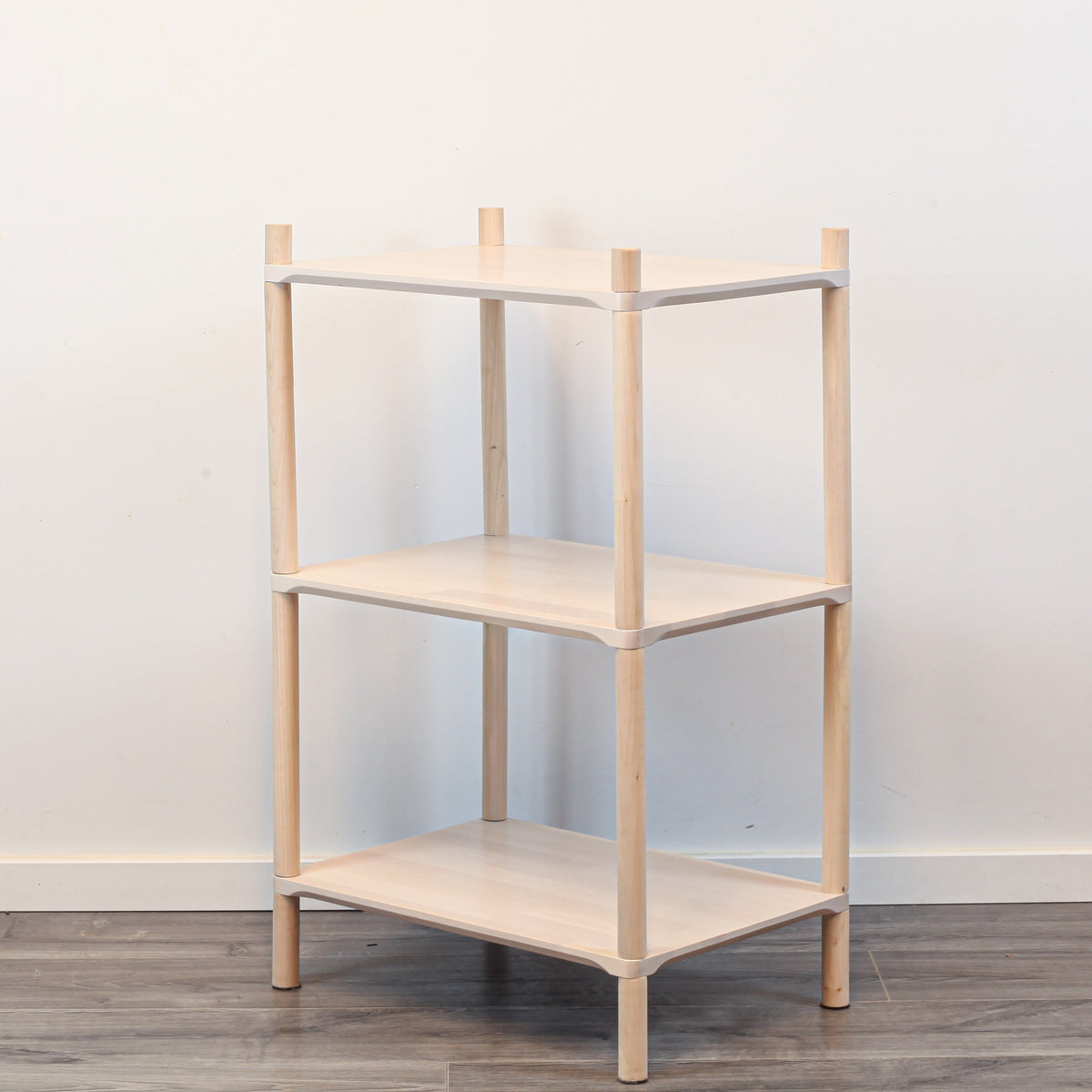 One Little Pine Small 3-Shelf Montessori-Inspired Wooden Shelving Unit shown from an angled view, highlighting the open shelves at child height.