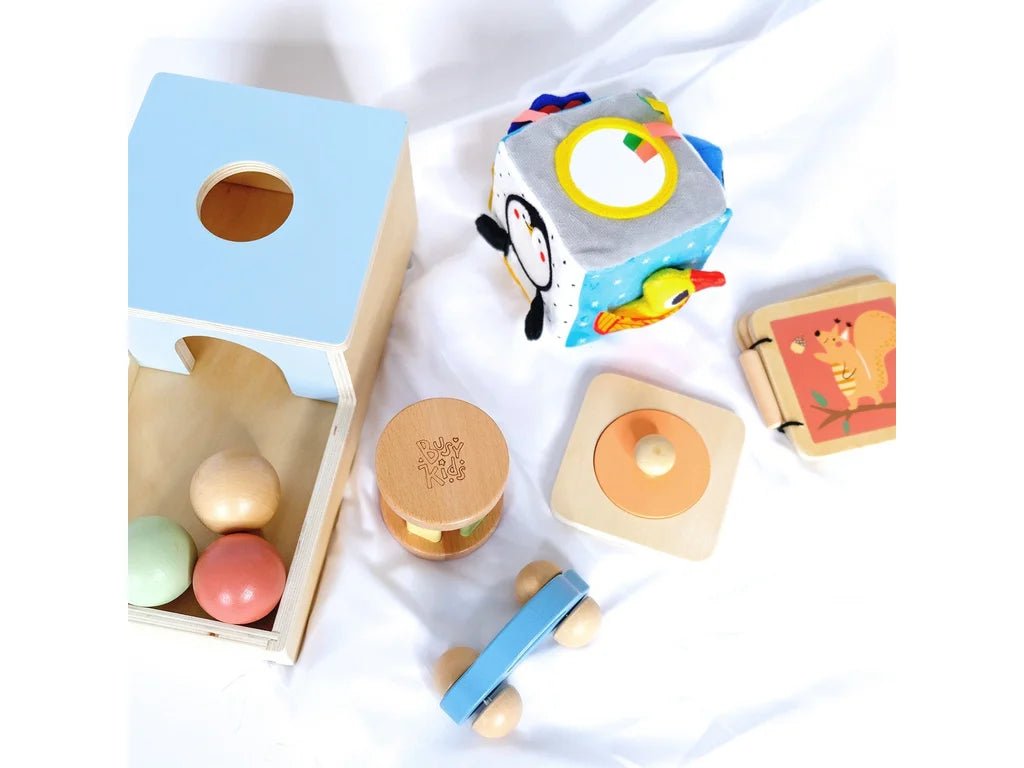 Montessori Play Box – 6–12 Months, 7-Toy Rolling & Reaching Set - Tiny Tugz™