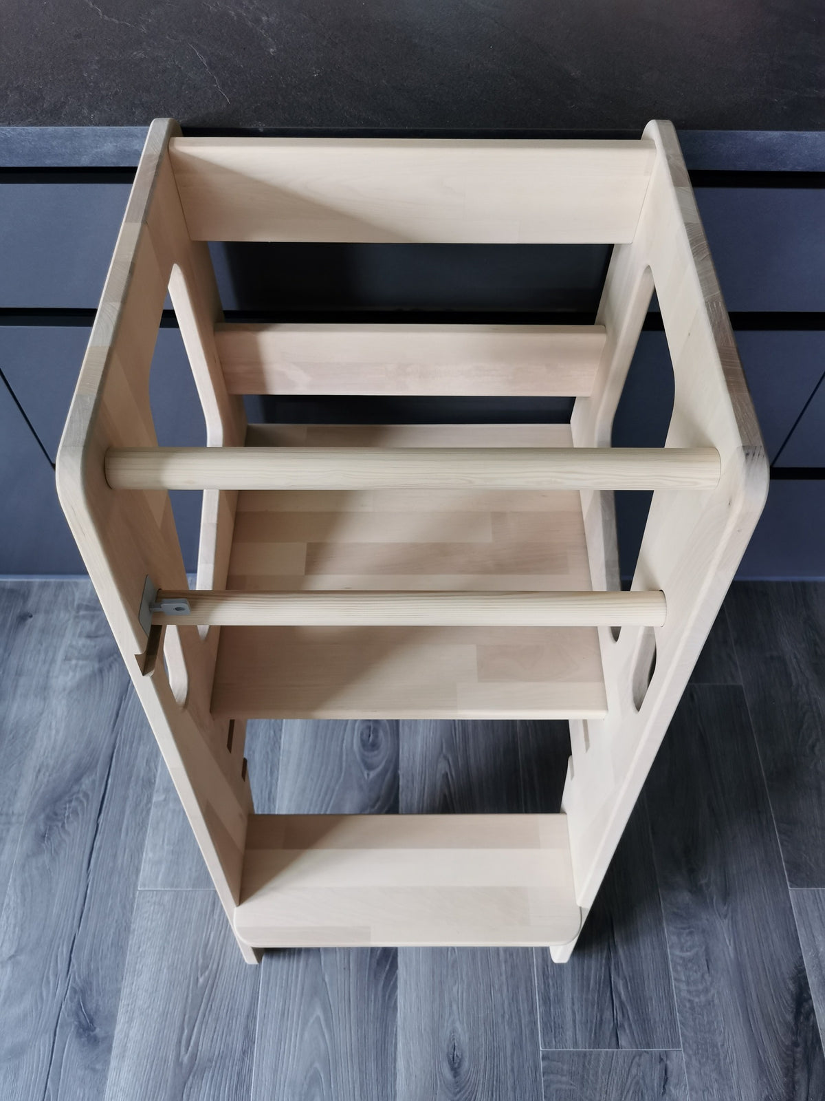 Montessori Tower Safety+ — close-up of birch wood finish