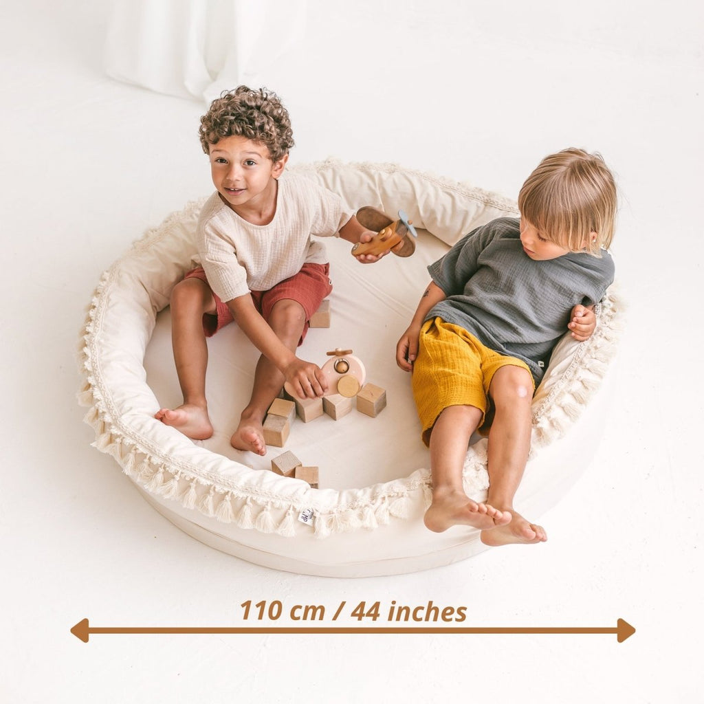 Round Nest Play Mat & Kids Lounger with Tassels - Ecru - 110 cm - Tiny Tugz™