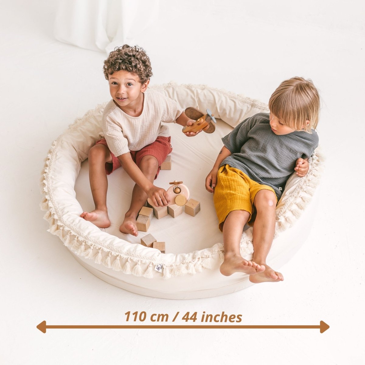 Round Nest Play Mat & Kids Lounger with Tassels - Ecru - 110 cm - Tiny Tugz™