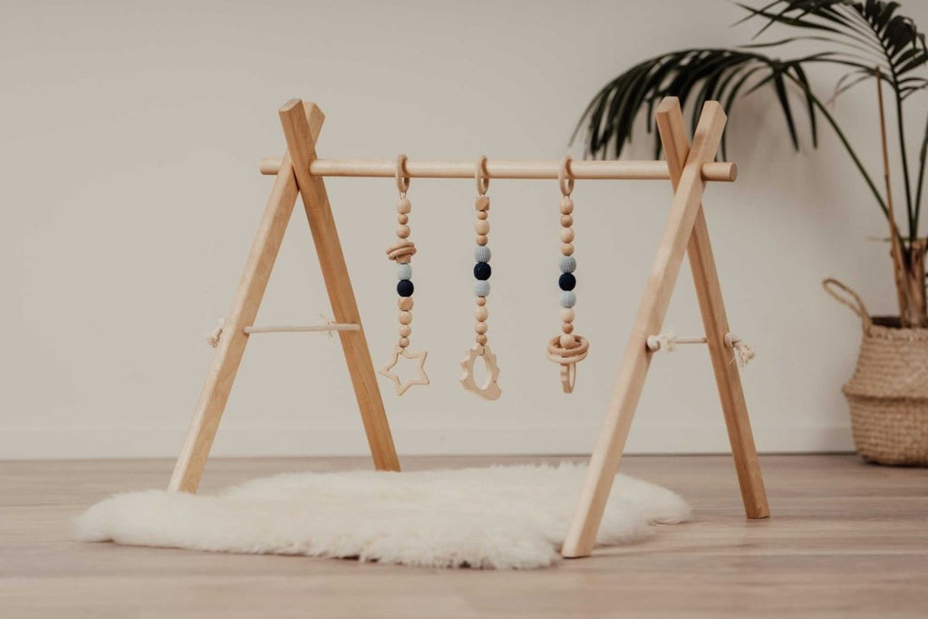 Wooden Baby Gym with Blue Toys – Montessori Play Arch - Tiny Tugz™